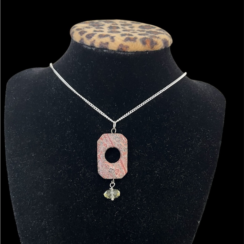 Elegant carved stone pendant plus a Silver plated Necklace